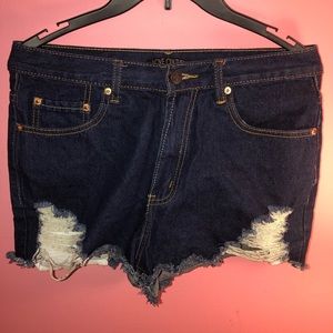 Shredded blue denim shorts from Love Culture
